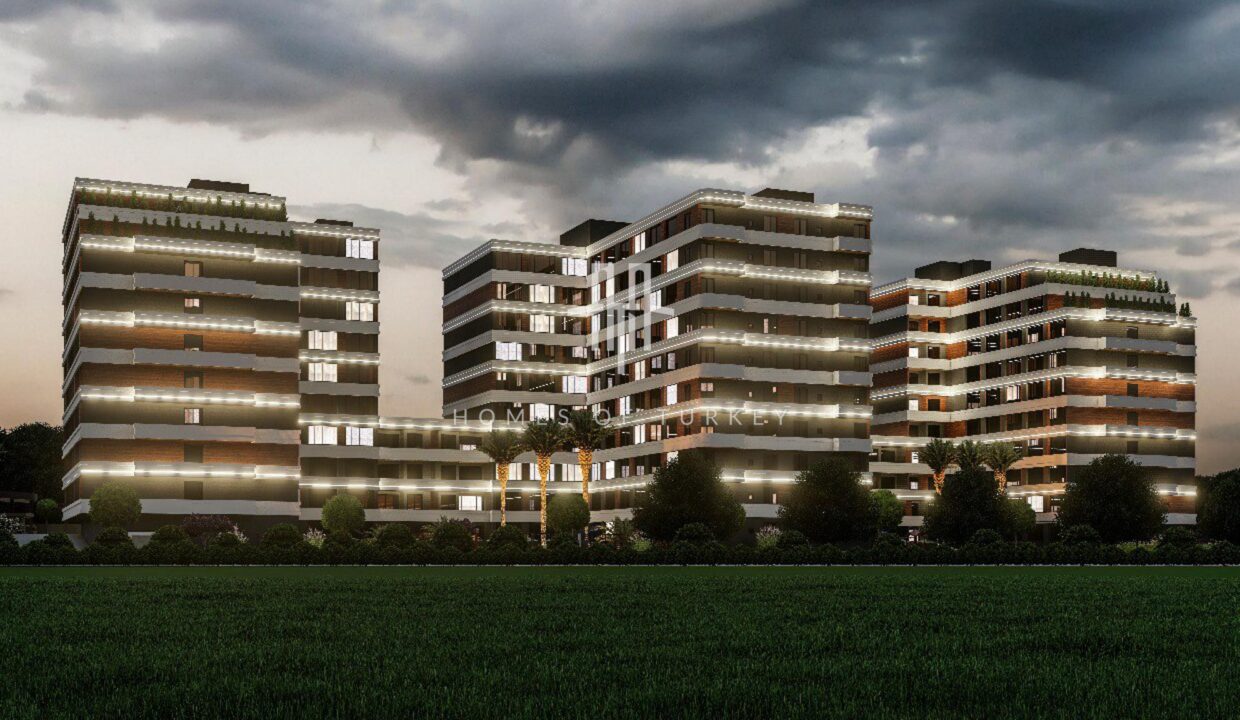 Flats for Sale in Installments in a Complex with a Pool within Walking Distance to the Sea in Mersin 1