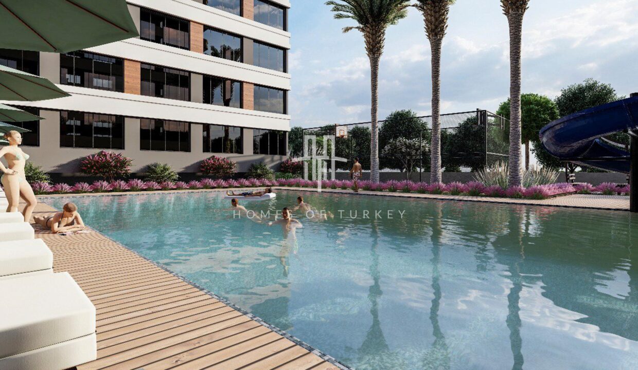 Flats for Sale in Installments in a Complex with a Pool within Walking Distance to the Sea in Mersin 6